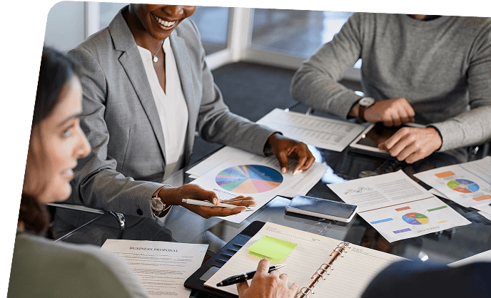 Business professionals reviewing documents