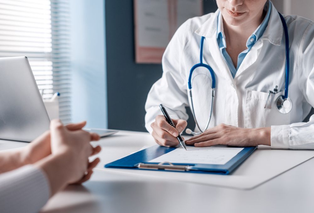 A hospital administrator discussing a detailed and transparent medical bill with a patient, emphasizing clear pricing and cost transparency in healthcare.